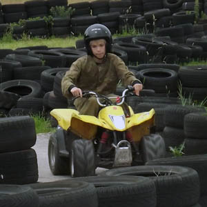 Photograph of Child riding a quad bike around our track